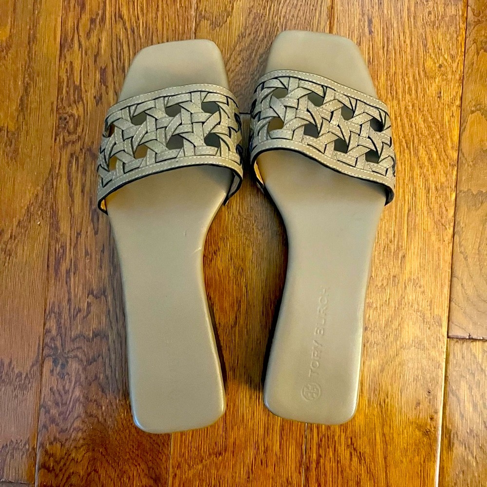 Basket-Weave Clog. Hand-woven leather and a wooden sole. Foam padding on footbed